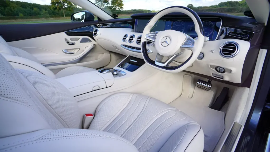 white mercedes benz interior london chauffer service