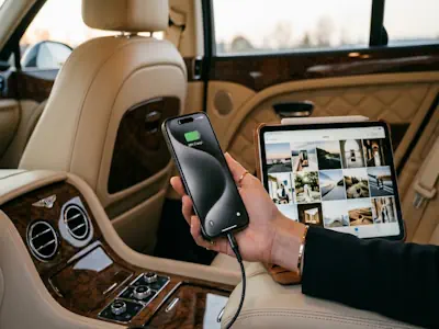 Staying connected with fast Wi-Fi and charging points in a Bentley Mulsanne chauffeur service.