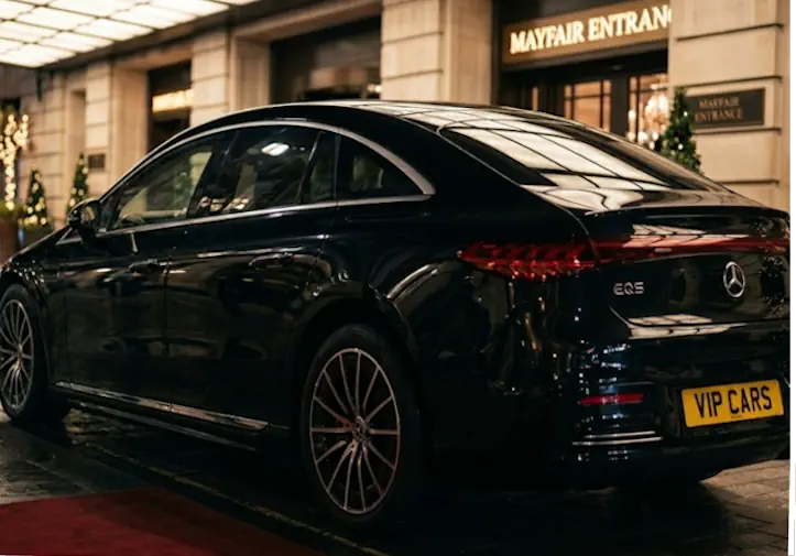 A luxury Mercedes EQS at a VIP drop-off point, illustrating the effortless arrival experience provided by our London event chauffeur service.