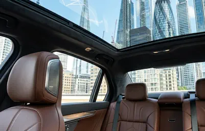 Enjoying a city tour through the glass roof of a BMW i7