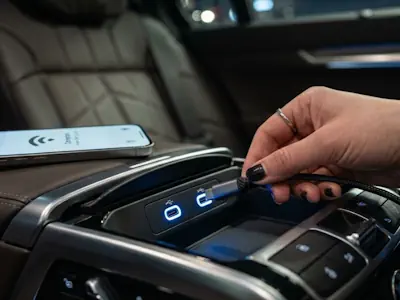 High-speed Wi-Fi and USB charging ports inside a luxury BMW i7 chauffeur car.