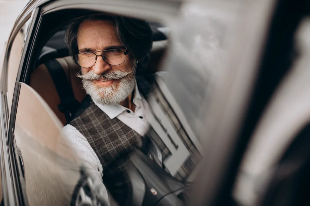 business man sitting his car back sit