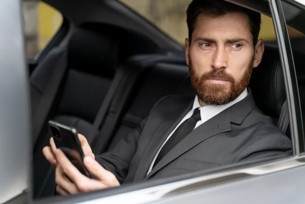 Professional Twickenham Stadium chauffeur service driving a Range Rover through South West London towards HQ Stadium on a Six Nations matchday.