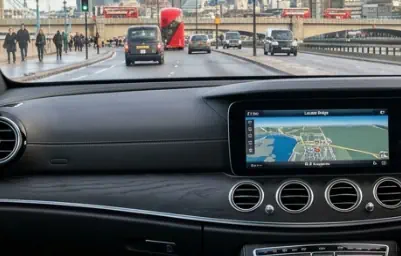 Interior view of a Mercedes E-Class Chauffeur London during a morning business commute.