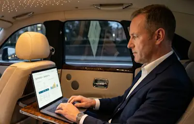 A quiet and professional Rolls-Royce Ghost for business meetings.