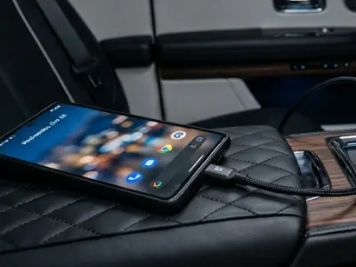 Fast Wi-Fi and phone charging ports inside a Rolls-Royce Ghost car