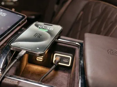 Stay connected with high-speed Wi-Fi and charging ports inside our Rolls-Royce Phantom